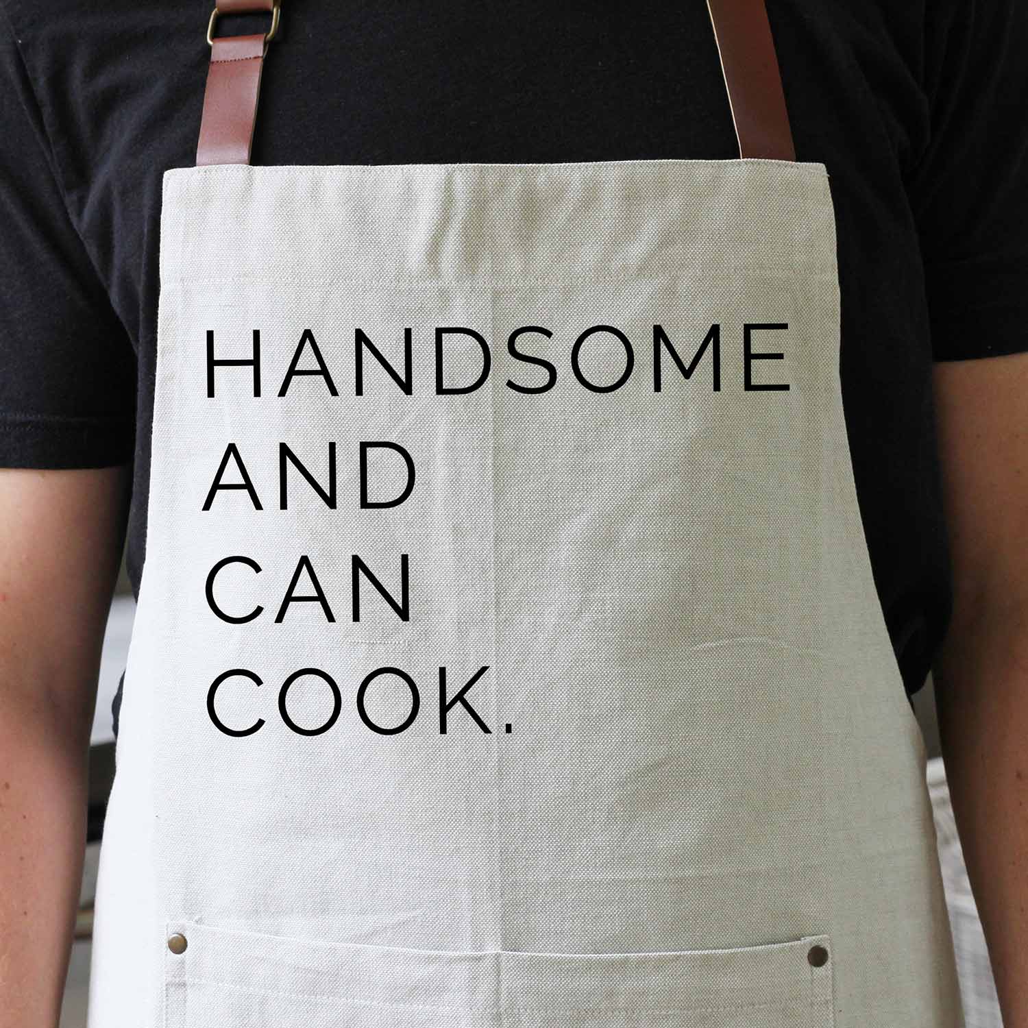 http://madeinwashington.com/cdn/shop/files/10032-Porter-Lane-Home-Chef-Apron-Handsome-And-Can-Cook-2023.jpg?v=1684960345