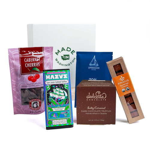An assortment of locally made chocolate confections on a white background | Gourmet Chocolate Gifts| Chocolate Tasting Flight | Made In Washington | Washington Gift Ideas | Artisan Chocolate Gift Basket