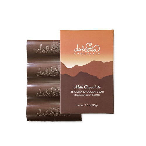 Dolcetta milk chocolate bar and packaging on a white background | Dolcetta 45% Milk Chocolate Bar | Made In Washington | Artisan Made Candy Bars