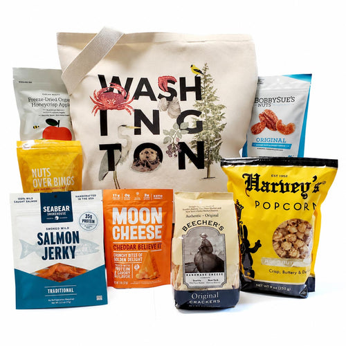 Assorted snack packages including salmon jerky, moon cheese, and popcorn with a tote bag labeled 'Washington'. 