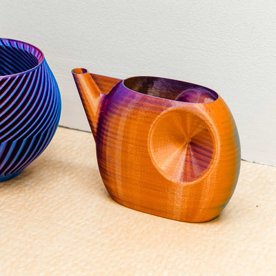 Valerie Watering Can Teal Burnt Orange Purple