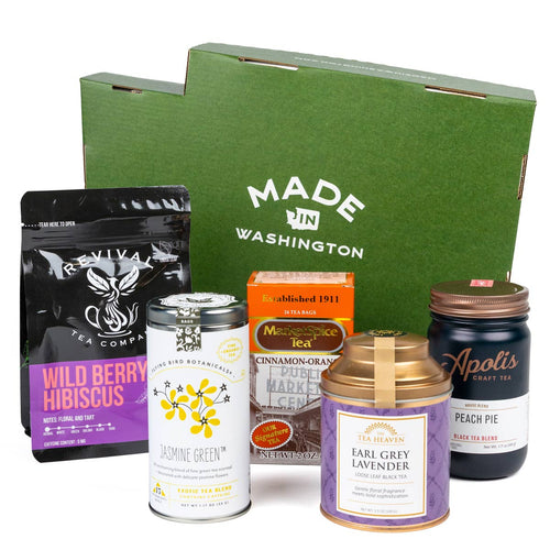 Teas Across Washington gift set with five artisan teas displayed in front of a green Washington-shaped box.