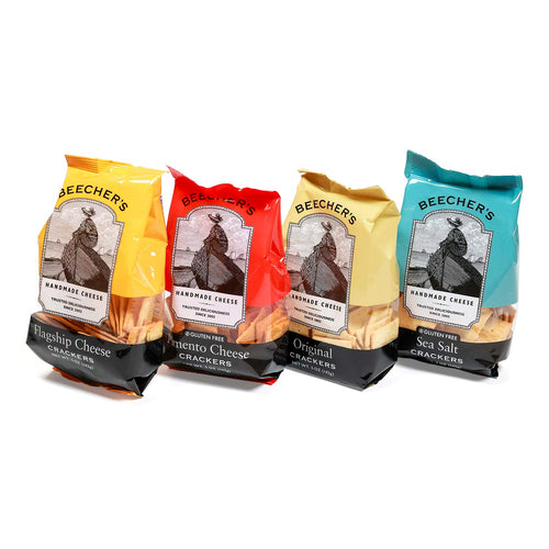 Four bags of different flavored crackers on a white background | Beecher's Artisan Cracker Sampler | Made In Washington | Local Snack Crackers | Local Food Gifts