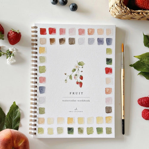 Watercolor workbook titled 'Fruit' with a pen and fruit on a white surface | Emily Lex Studio | Fruit Watercolor Workbook for Beginners | Made In Washington | Local Gifts