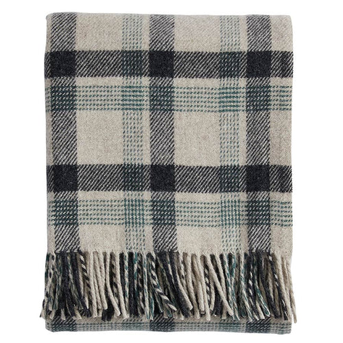 Folded black and green plaid blanket with fringes on a white background | Pendleton Eco Wise Washable Throw Shale Copper | Made In Washington | Local Gifts