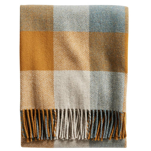 Folded plaid blanket with brown, beige, and blue colors on a white background | Pendleton Eco Wise Washable Throw Shale Copper | Made In Washington