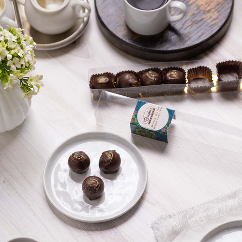 Box of chocolate truffles with Bright's Candies of Walla Walla brand label on a white surface. | Bright's Candies Walla Walla Wine Cordials | Made In Washington | PNW Chocolate Gifts