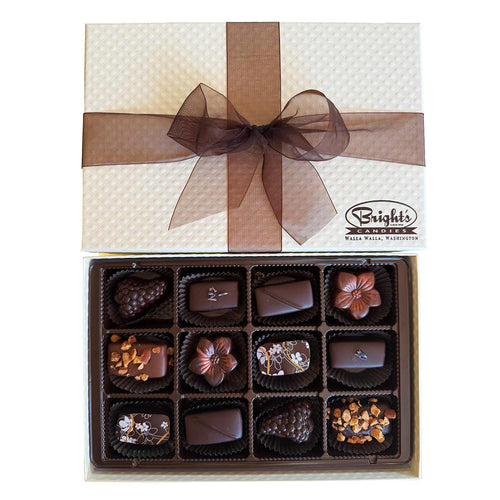 Box of chocolates with a brown ribbon and Bright's Candies logo on a white background | Bright's Candies Specialty Chocolate Box Assortment | Made In Washington | Local Chocolate Candies