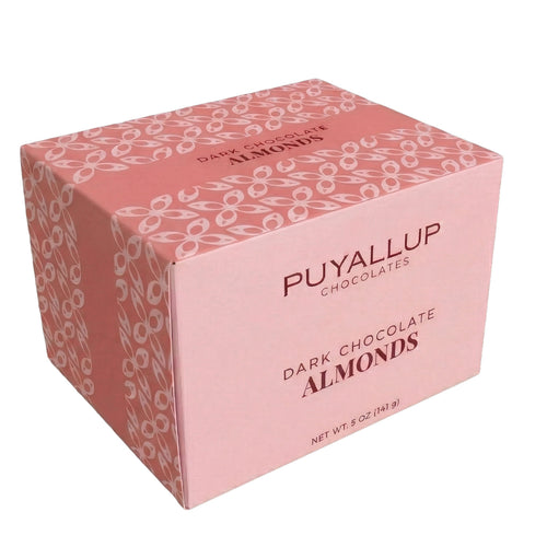 Chocolate-covered almonds on a white background | Puyallup Chocolates locally made chocolate treats at Made In Washington gift stores