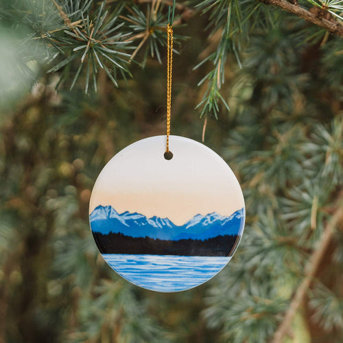 Summer on the Sound round ceramic ornament with mountain and pacific ocean design on a white background