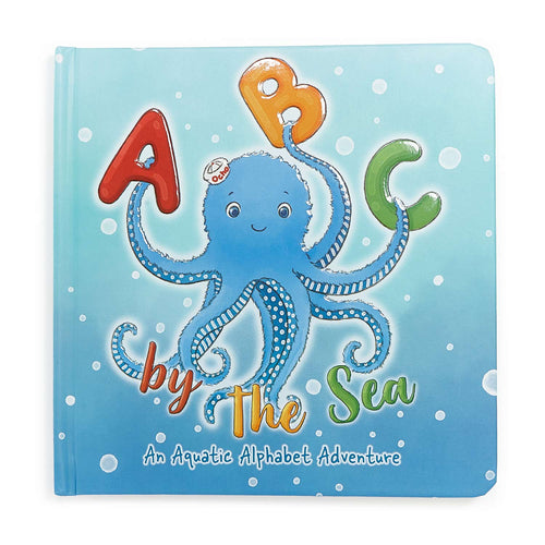 Bunnies By The Bay children's board book titled "ABC by the Sea: An Aquatic Alphabet Adventure" featuring a blue octopus holding red, orange, and green letters on a light blue water-themed cover.