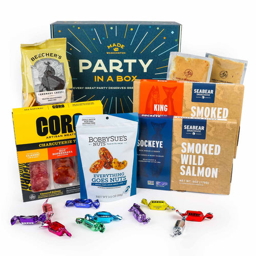 Gourmet Pacific Northwest gift basket arrangement with artisan snacks and sweets.