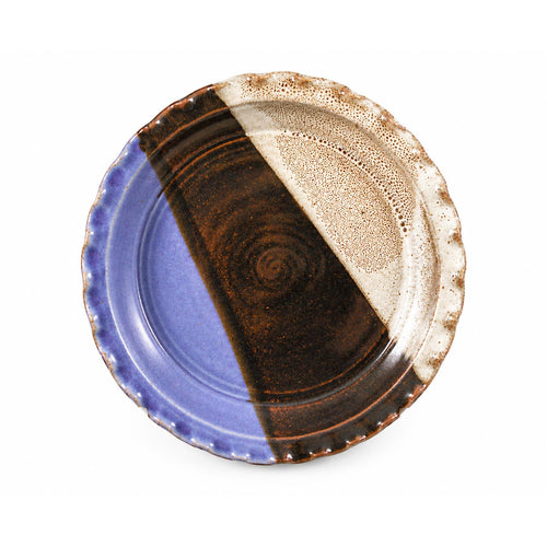 Wheel-thrown stoneware pie pan featuring the Storm glaze in blue, black, brown, and white by Clear Creek Pottery