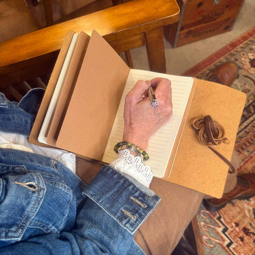 Chestnut brown leather A5 journal tied with a wraparound leather lace by 48 Degrees North Leather Co