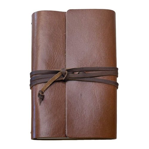 Chestnut brown leather A5 journal tied with a wraparound leather lace by 48 Degrees North Leather Co