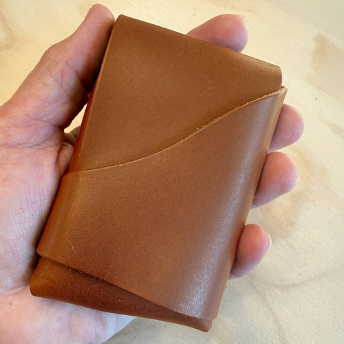 Walnut brown folded leather card wallet with tuck flap closure by 48 Degrees North Leather Co