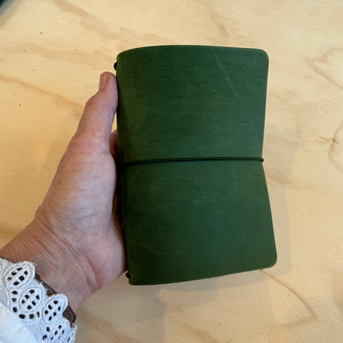 Forest green leather pocket field journal with black elastic band by 48 Degrees North Leather Co
