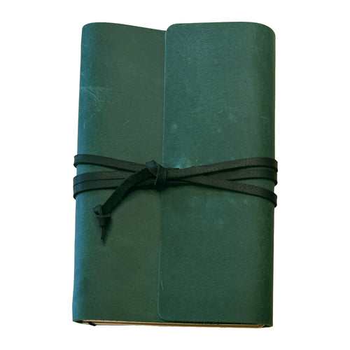 Evergreen forest green leather A5 journal bound with a matching leather tie lace by 48 Degrees North Leather Co