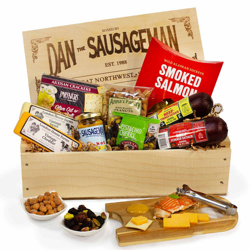 Gift basket from Dan the Sausageman with various food items including smoked salmon, cheese, and crackers. | Made In Washington State Gift Baskets | Dan The Sausageman Wood Crate | Washington Care Package
