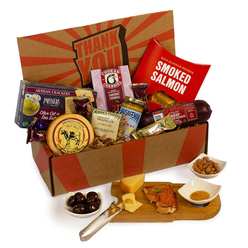 Gourmet gift basket with smoked salmon, cheese, and crackers on a white background | Made In Washington State Gift Baskets | Dan The Sausageman Thank You Gift Box
