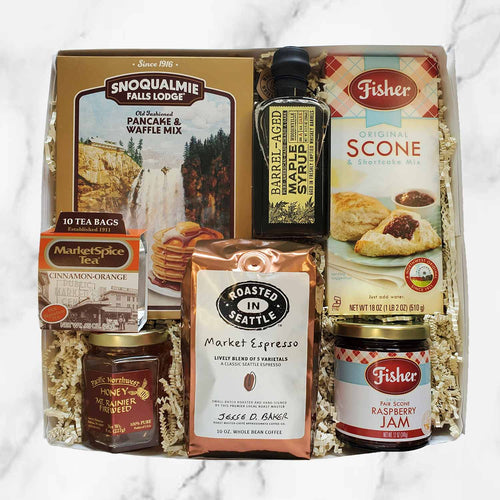 Assorted food and beverage products including scones, maple syrup, coffee, jam, and tea on a white background. | Made In Washington State Gift Baskets | Breakfast In A Box | Food Gift Basket | Care Packages From Washington State | PNW Gifts