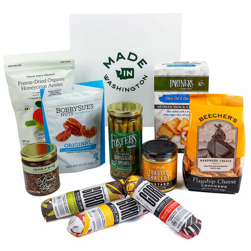 Assorted food products including honey, nuts, and cheese on a white background with 'Made in Washington' branding. | Salami Charcuterie Box | Made In Washington | Local Foodie Grazing Box