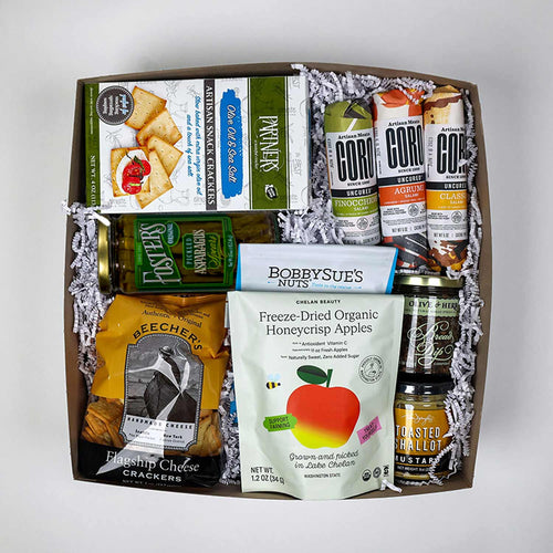 Assorted food products including honey, nuts, and cheese on a white background with 'Made in Washington' branding. | Salami Charcuterie Box | Made In Washington | Local Foodie Grazing Box