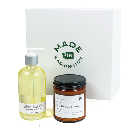 Bottle of lemon-lavender hand soap and a Salish sea spray candle jar with 'Made in Washington' logo in the background. | Candle and Soap Set | Made In Washington | Spa Break Gift | Mother's Day Gift Idea | Locally Made Gift Basket