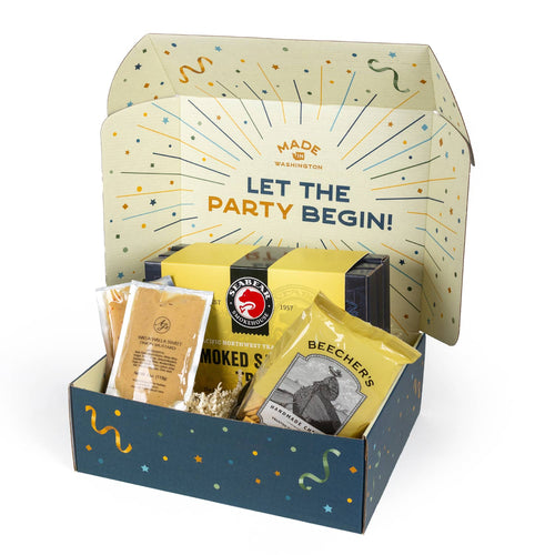Party In A Box gift set with SeaBear Smoked Salmon Trio, Beecher's crackers, and AJ's mustard. on a white background