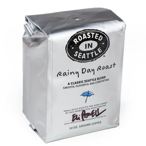 Coffee bag labeled 'Roasted in Seattle Rainy Day Roast' on a white background | Roasted In Seattle Rainy Day Roast | Made In Washington | Local Coffee Gift Ideas