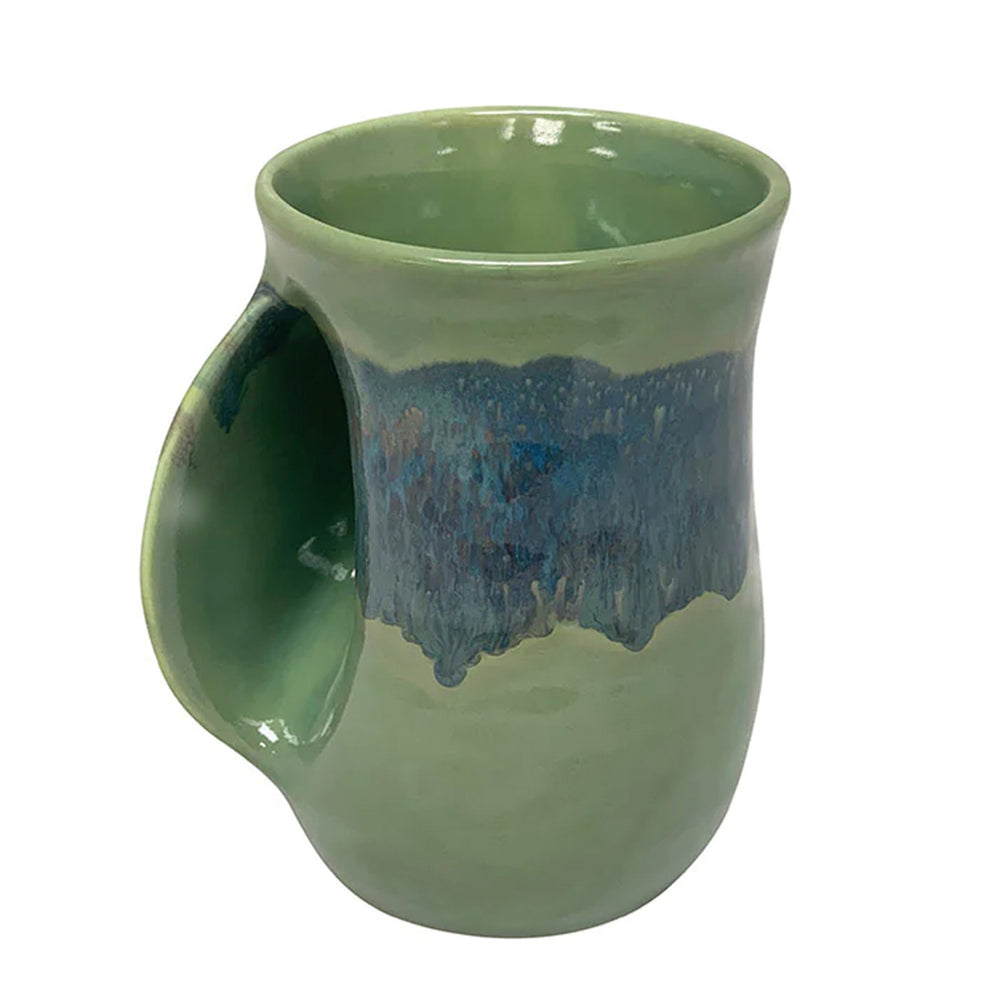 Misty Green Clay In Motion Hand Warmer Mug Left | Made In Washington | Coffee Mugs | Large Hot Tea Mug
