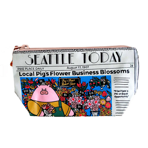 Pouch designed like a Seattle Today newspaper with a cartoon pig and flower design. | Chalo Seattle Today Newspaper Pouch | Made In Washington | Local Gifts