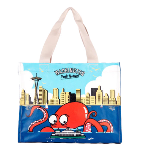 Tote bag with a cartoon octopus and the Seattle cityscape design on a white background | Chalo SEA Octopus Skyline Travel Tote | Made In Washington | PNW Gifts
