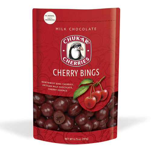 Red package of Chukar Cherries Milk Chocolate Cherry Bings on a white background | Chukar Cherries Milk Chocolate Bing Cherry Gifts | Made In Washington | Local Gifts for Chocolate Lovers