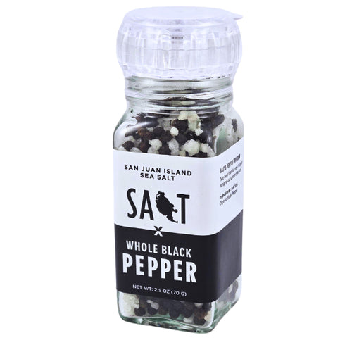 An acrylic grinder of San Juan Island Sea Salt and Whole Black Pepper, featuring a white and black label with the brand name 'SALT' and on the San Juan Island logo, topped with a clear plastic crimped grinder cap.