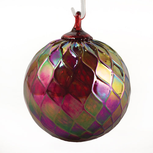 Red glass ornament with wavy pattern on a white background |Hand Blown Glass Ruby Birthstone Ornament | Made In Washington | July Birthdays