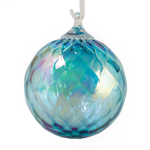 Light Blue glass ornament on a white background | Hand Blown Glass Topaz Birthstone Ornament | Made In Washington | December Birthday