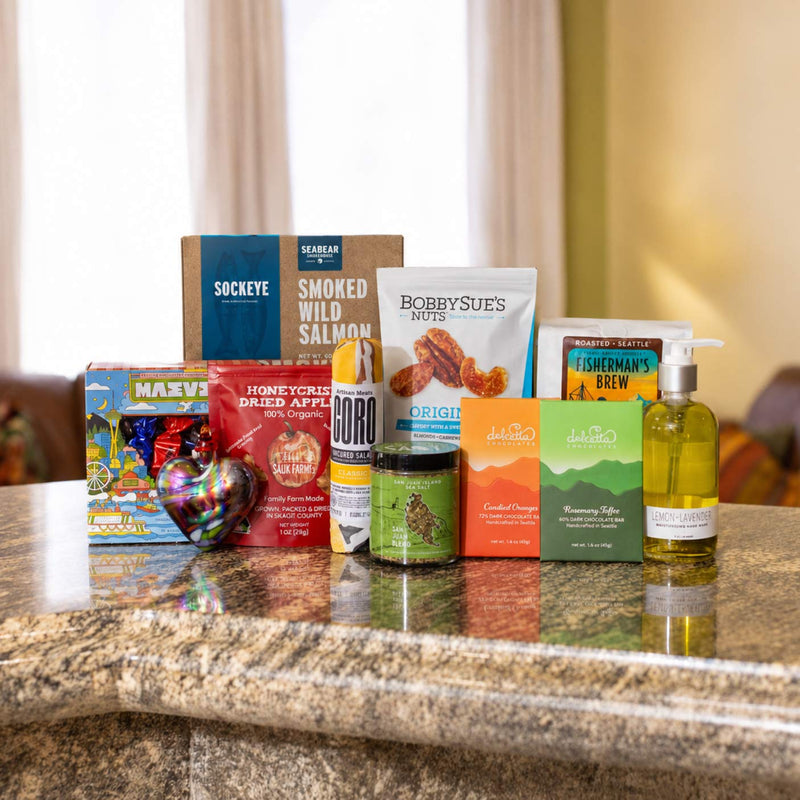 Shop corporate gift arrangements featuring local Pacific Northwest foods, artisan sweets, and hand care.