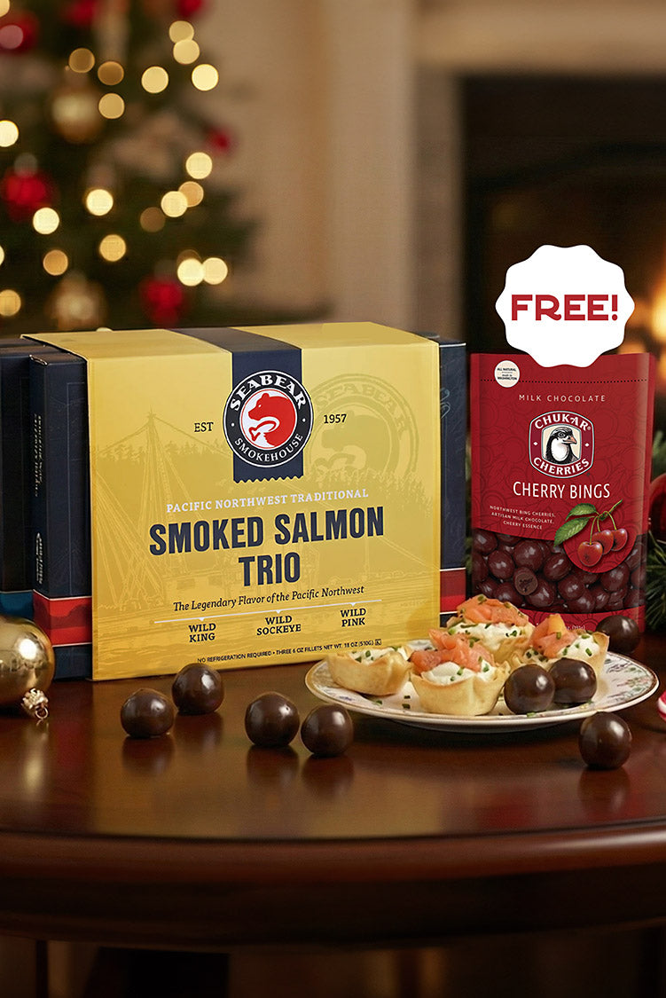 SeaBear Smoked salmon trio packaging with festive decorations on a table + FREE Chukar Cherry Bings | Made In Washington | Holiday Specials