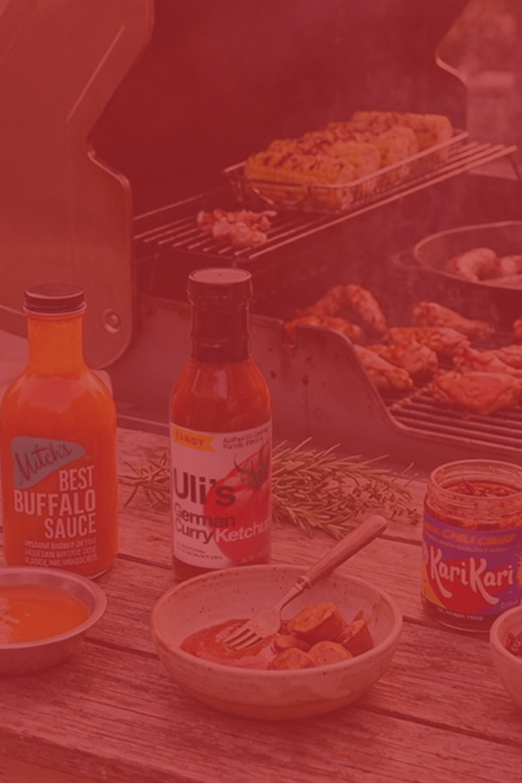 Memorial Day Free Shipping Weekend - Grilling setup with artisan made PNW sauces and ingredients on a table