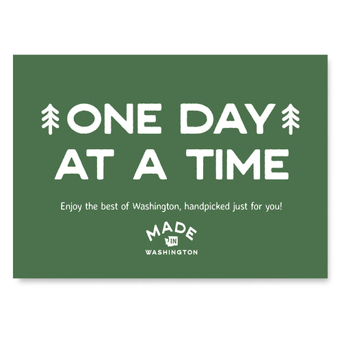 Green banner with 'One Day at a Time' text and 'Made in Washington' logo on a white background | Create custom gift boxes at Made In Washington gift stores.