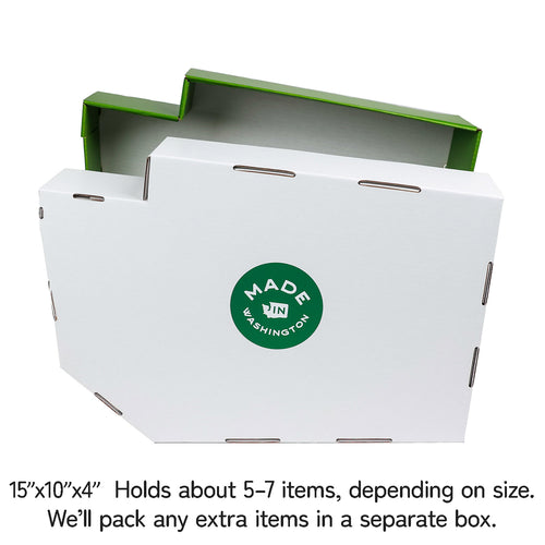 White Washington State shaped box with green bottom and 'Made in Washington' label on a white background | Design Your Own Gift Basket in a state shaped box | Local Gift Baskets