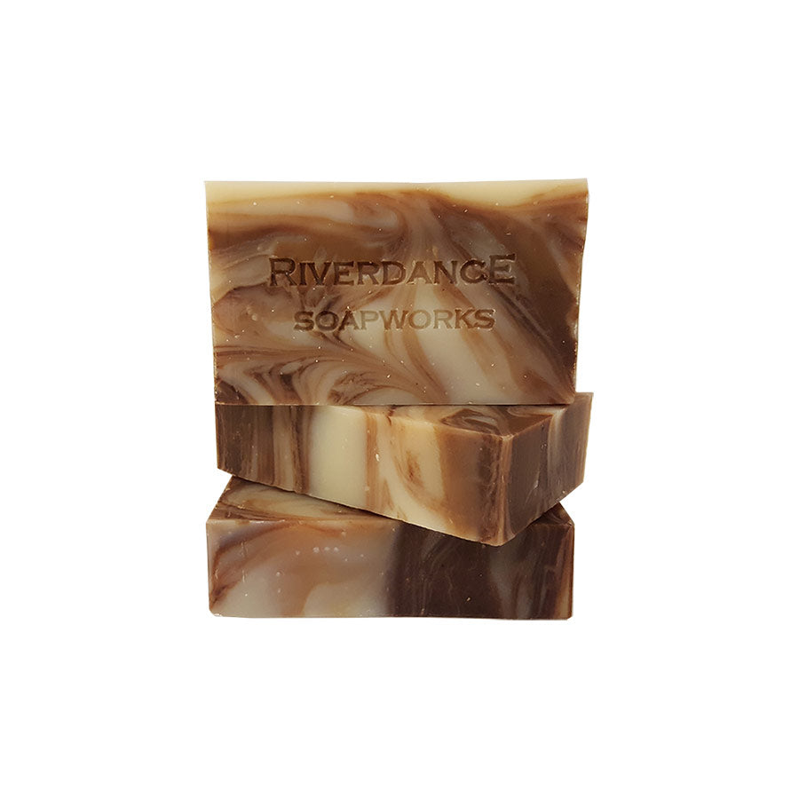 https://madeinwashington.com/cdn/shop/products/6-00538RiverdanceSoapworksCedarWhiskeySoap.jpg?v=1621447475